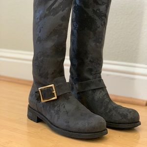 Knee high Rider Boots.